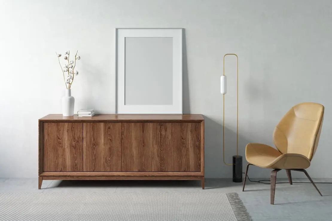 Entrance hall decorated with wooden furniture and microcement color on white wall and floor