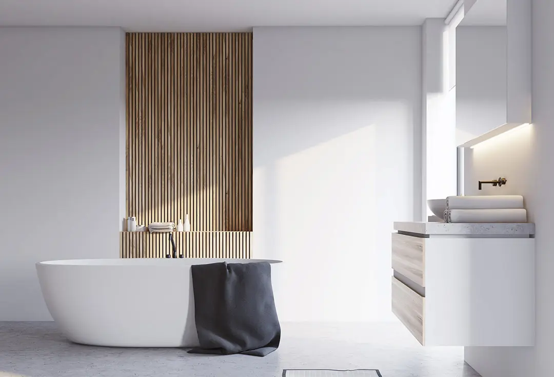 Bathroom with wall and floor of light colored microcement