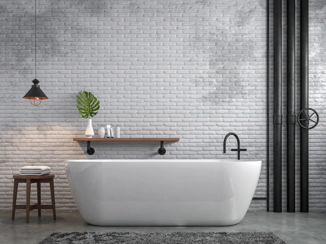 Bathroom with microcement floor in gray tones