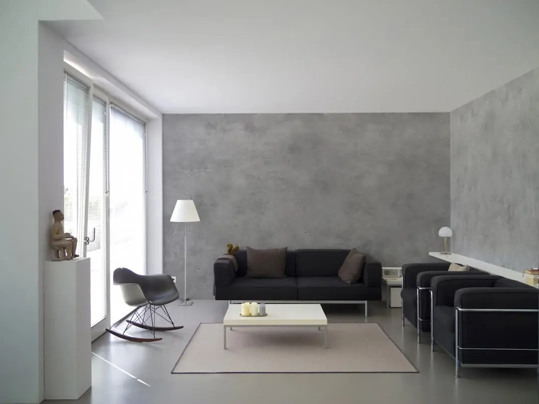 Living room connected to terrace and floor covered with decorative concrete