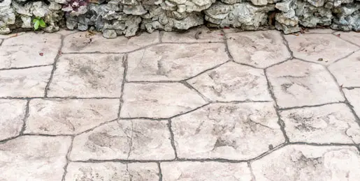 White stamped concrete sidewalk