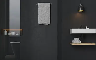 Baño decorado con la veladura metálica MyGlow, que proporciona un acabado con tonos elegantes y oscuros