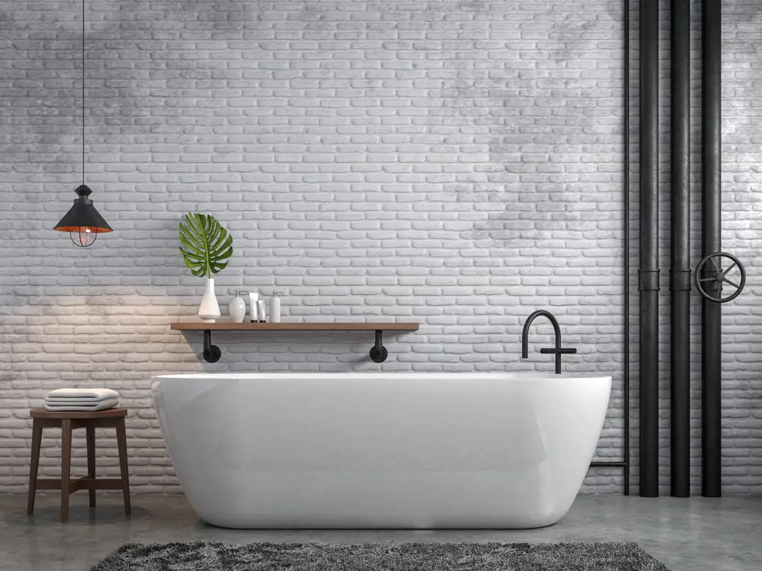 Mikrosementti kylpyhuoneessa, jossa on teollinen tyyli, joka korostaa lattian koristepinnoitusta