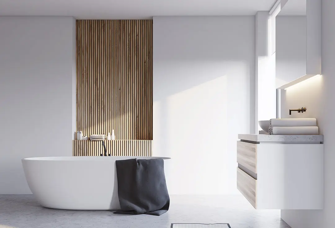 Fürdőszoba világos színű mikrocement fal- és padlóburkolattal