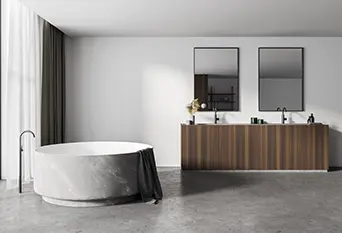 Açık alanları olan modern bir banyoda mikro çimento ve dairesel bir küvet